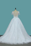 2024 Mermaid Tulle Scoop Short Sleeve Wedding Dresses With Applique And Sash PP34MKHZ